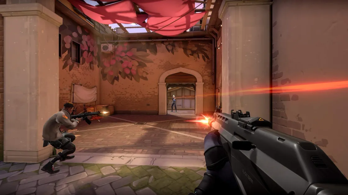 First-person perspective of a tactical shooter player holding an angle with an assault rifle